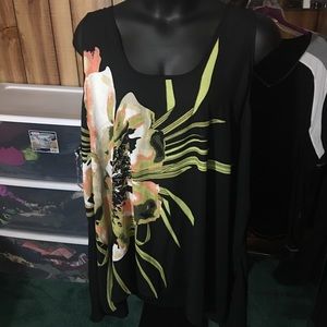 Shark bite hem, tank sleeve top.